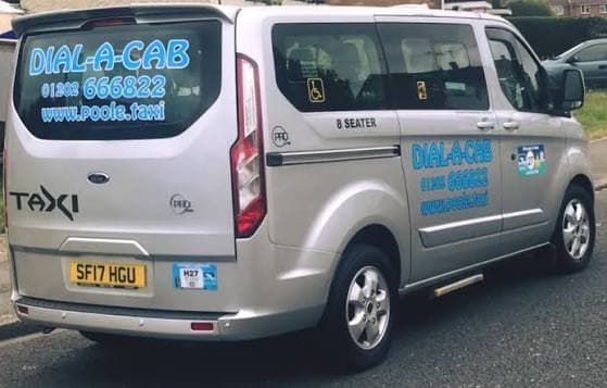 Dial A Cab team and vehicle